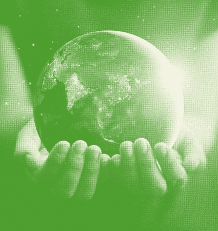 Hands holding the Earth representing Dalkia’s commitment to the planet as energetic services company