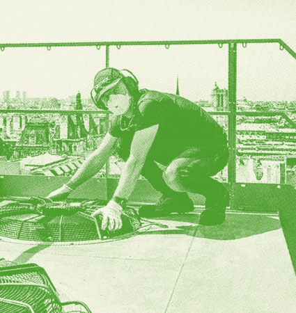 Multi-technical technician holding an air vent on the roof of a parisian building 