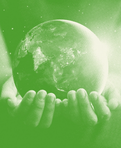 Hands holding the Earth representing Dalkia’s commitment to the planet as energetic services company